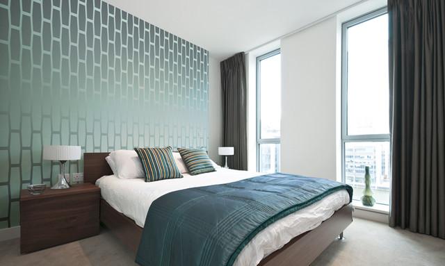 Carta da parati blu-verde in un design moderno della camera da letto